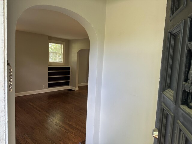 2910 Woodlawn Dr, Nashville, TN 37215 - corridor featuring arched walkways, dark wood-type flooring, and baseboards