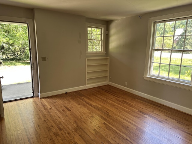2910 Woodlawn Dr, Nashville, TN 37215 - spare room with wood-type flooring and healthy amount of natural light