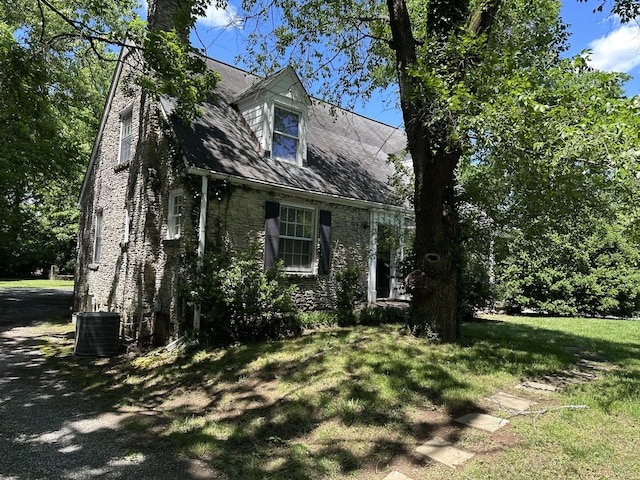 2910 Woodlawn Dr, Nashville, TN 37215 - view of property exterior with central air condition unit and a lawn