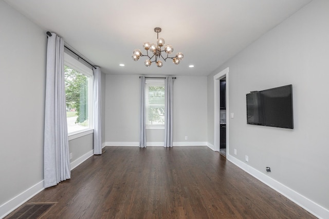 601 Lawrence St, Old Hickory, TN 37138 - unfurnished living room featuring a chandelier, dark wood finished floors, baseboards, and recessed lighting