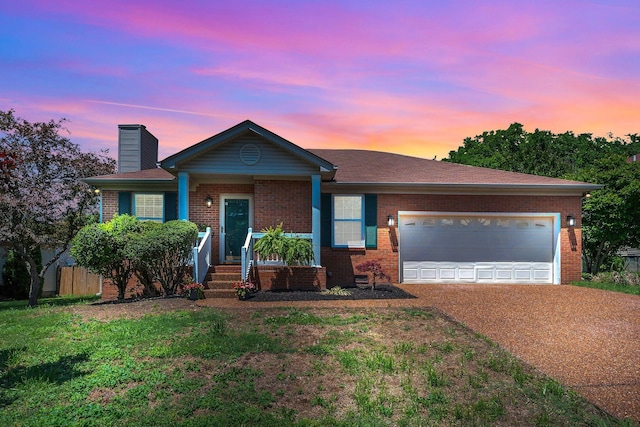 204 Nathan Dr, Goodlettsville, TN 37072 - ranch-style house featuring a chimney, driveway, a garage, and brick siding