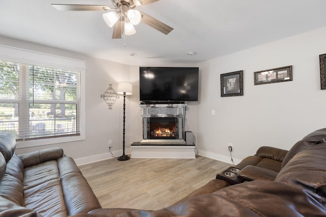 3021 Cambridge Ct, Lewisburg, TN 37091 - living room with ceiling fan, a glass covered fireplace, baseboards, and wood finished floors