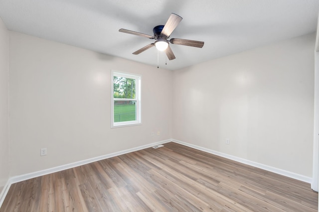 2897 Old Medina Rd, Jackson, TN 38305 - empty room with light wood-style floors, baseboards, and ceiling fan