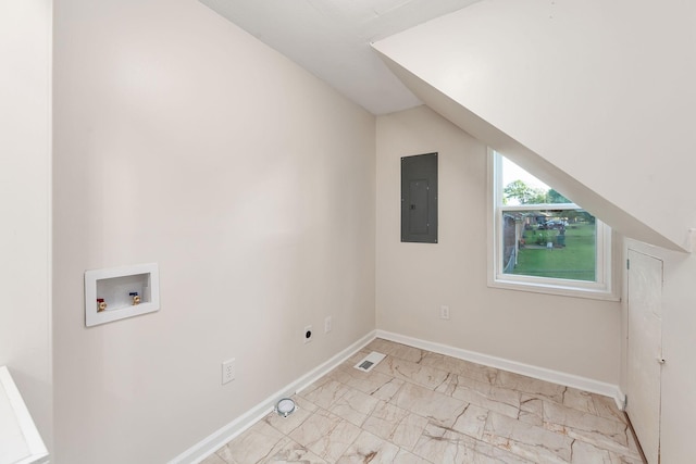 2897 Old Medina Rd, Jackson, TN 38305 - additional living space with electric panel, light marble finish floors, and baseboards