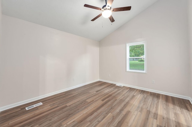2897 Old Medina Rd, Jackson, TN 38305 - unfurnished room with wood finished floors, baseboards, lofted ceiling, and ceiling fan