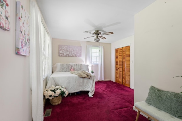 110 Rainbow Cir, Columbia, TN 38401 - bedroom featuring carpet flooring, a closet, ceiling fan, and baseboards