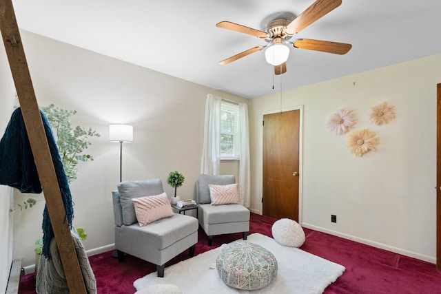 110 Rainbow Cir, Columbia, TN 38401 - living area featuring carpet, baseboards, a ceiling fan, and a baseboard radiator