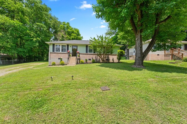 110 Rainbow Cir, Columbia, TN 38401 - ranch-style home with a front lawn and brick siding