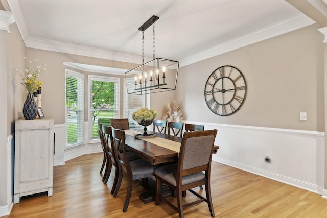 320 Julianna Cir, Franklin, TN 37064 - dining area with a chandelier, light wood-style floors, crown molding, and baseboards