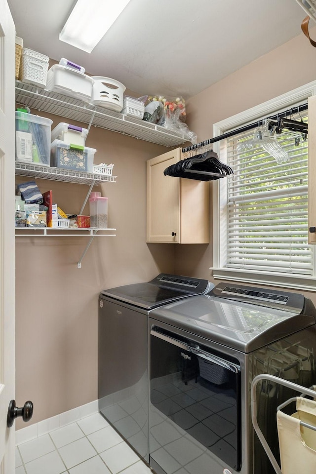 320 Julianna Cir, Franklin, TN 37064 - washroom featuring cabinet space, separate washer and dryer, light tile patterned floors, and baseboards