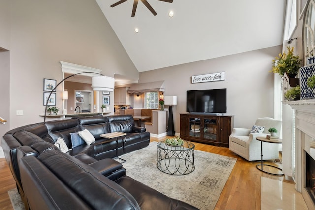 320 Julianna Cir, Franklin, TN 37064 - living room with a premium fireplace, high vaulted ceiling, ceiling fan, light wood-type flooring, and recessed lighting