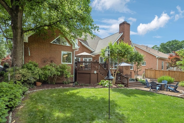 320 Julianna Cir, Franklin, TN 37064 - rear view of house with a deck, brick siding, a chimney, and stairway