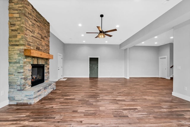 1055 Hunters Landing Ln, Smithville, TN 37166 - unfurnished living room with ceiling fan, wood finished floors, a fireplace, recessed lighting, and baseboards