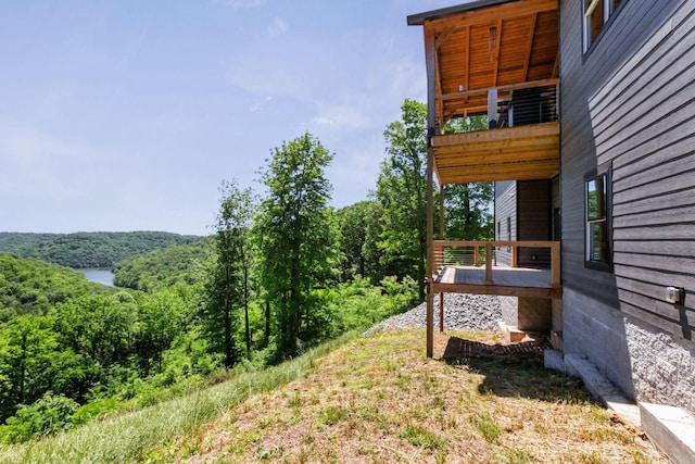 1055 Hunters Landing Ln, Smithville, TN 37166 - view of yard featuring a wooded view and a balcony