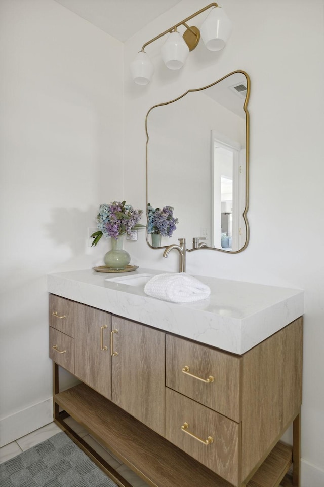 901 Elliston St, Old Hickory, TN 37138 - bathroom featuring vanity, baseboards, and tile patterned floors