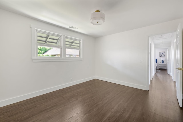 901 Elliston St, Old Hickory, TN 37138 - empty room featuring attic access, dark wood-style floors, and baseboards