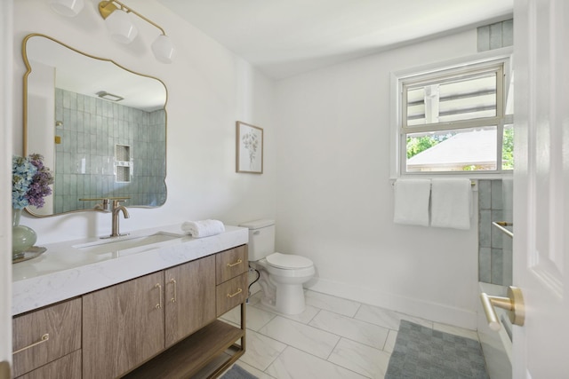 901 Elliston St, Old Hickory, TN 37138 - bathroom featuring vanity, toilet, a shower, and baseboards