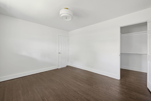 901 Elliston St, Old Hickory, TN 37138 - unfurnished bedroom featuring dark wood-style flooring, baseboards, and a closet
