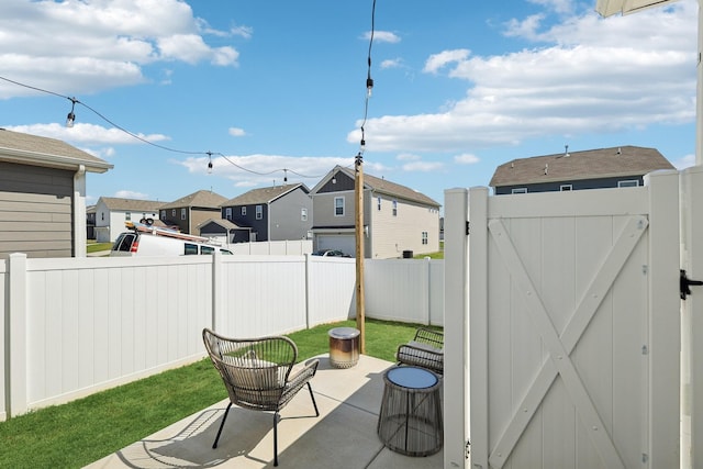 1507 Ashgrove Pl, Lebanon, TN 37087 - fenced backyard with a residential view, a gate, and a patio