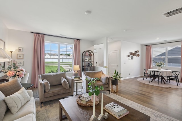 1507 Ashgrove Pl, Lebanon, TN 37087 - living area featuring wood finished floors, plenty of natural light, a water view, baseboards, and recessed lighting