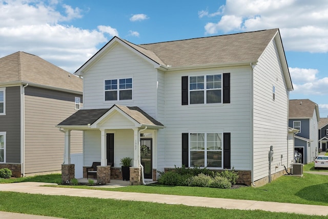 1507 Ashgrove Pl, Lebanon, TN 37087 - view of front of home with central air condition unit, a front lawn, a porch, and roof with shingles