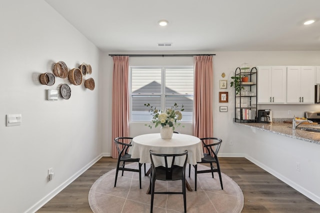 1507 Ashgrove Pl, Lebanon, TN 37087 - dining area with dark wood-style floors, recessed lighting, and baseboards