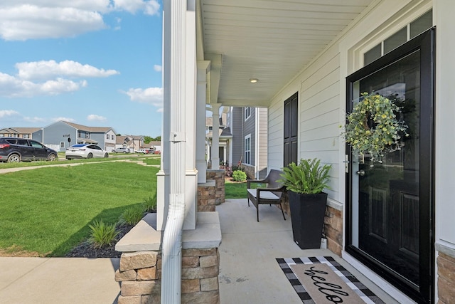 1507 Ashgrove Pl, Lebanon, TN 37087 - porch featuring a lawn and a residential view