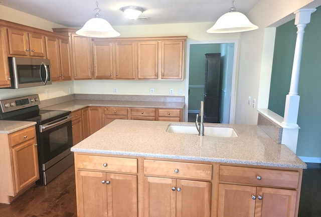 305 Lenox Ct, Springfield, TN 37172 - kitchen with appliances with stainless steel finishes, light stone counters, dark wood-type flooring, and hanging light fixtures