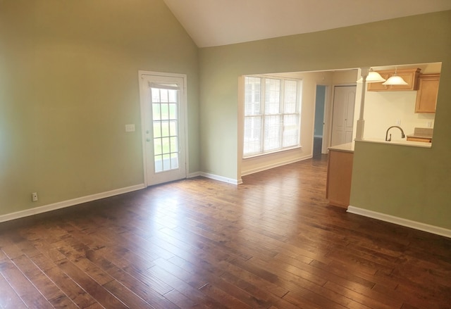 305 Lenox Ct, Springfield, TN 37172 - unfurnished living room featuring dark wood-type flooring and high vaulted ceiling