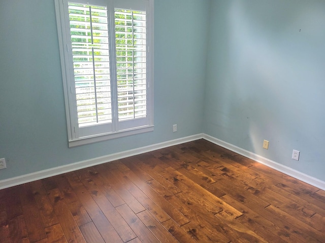 305 Lenox Ct, Springfield, TN 37172 - spare room featuring baseboards and dark wood-style floors