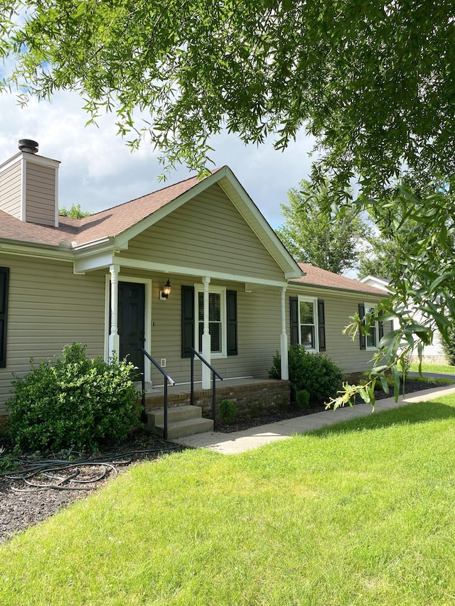 1834 Venada Trl, Murfreesboro, TN 37128 - single story home with a front yard, a chimney, covered porch, and roof with shingles