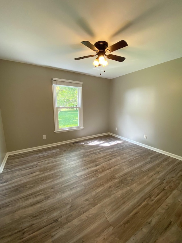 1834 Venada Trl, Murfreesboro, TN 37128 - spare room featuring dark wood-style floors, baseboards, and a ceiling fan