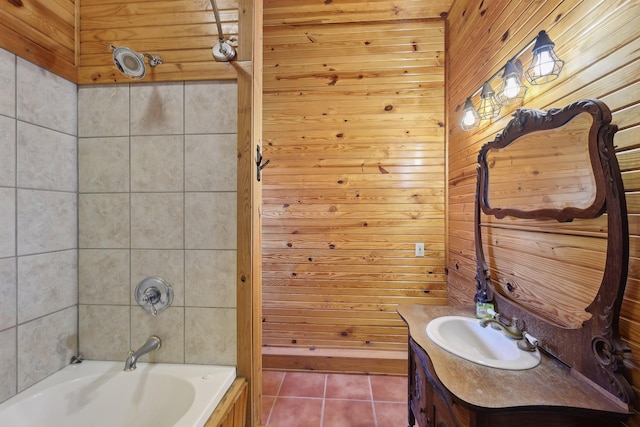 102 Nall Ave, Centerville, TN 37033 - full bathroom featuring wooden walls, vanity, tile patterned floors, and bathing tub / shower combination