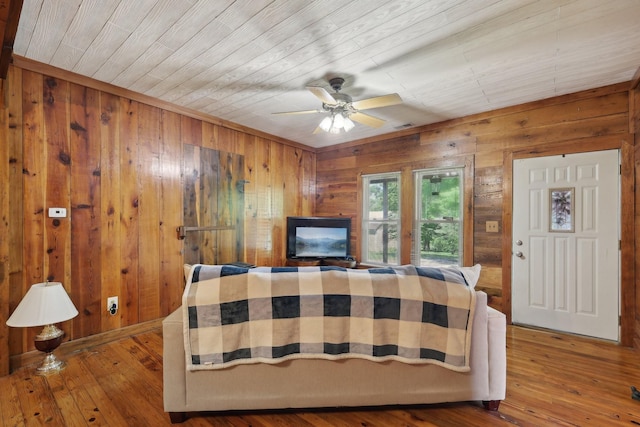 102 Nall Ave, Centerville, TN 37033 - living room featuring wooden walls, a ceiling fan, wood ceiling, and wood-type flooring