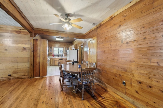 102 Nall Ave, Centerville, TN 37033 - dining space with wood walls, light wood-type flooring, ceiling fan, and wooden ceiling