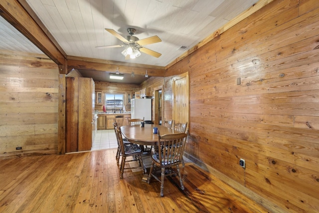 102 Nall Ave, Centerville, TN 37033 - dining space featuring wooden walls, light wood-style floors, ceiling fan, and wooden ceiling