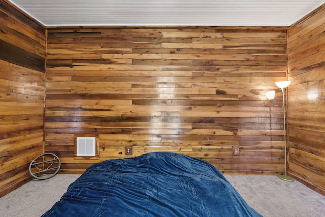 102 Nall Ave, Centerville, TN 37033 - carpeted bedroom featuring wood walls