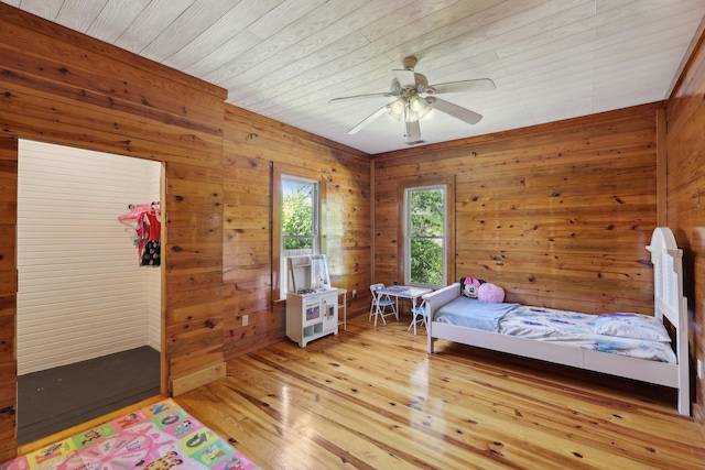 102 Nall Ave, Centerville, TN 37033 - bedroom featuring light wood finished floors, wood walls, a ceiling fan, and wooden ceiling