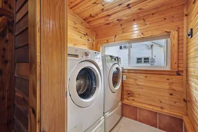 102 Nall Ave, Centerville, TN 37033 - washroom featuring washer and clothes dryer, light tile patterned flooring, wooden walls, and wooden ceiling