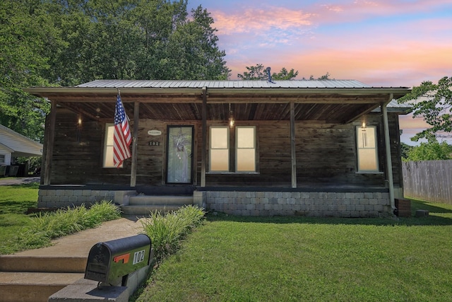 102 Nall Ave, Centerville, TN 37033 - view of front of house with a porch and metal roof