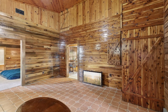 102 Nall Ave, Centerville, TN 37033 - unfurnished living room with wooden walls and wood ceiling