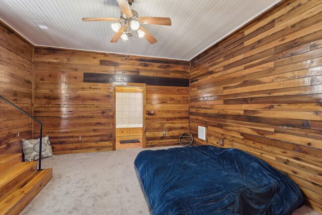 102 Nall Ave, Centerville, TN 37033 - carpeted bedroom featuring wooden walls