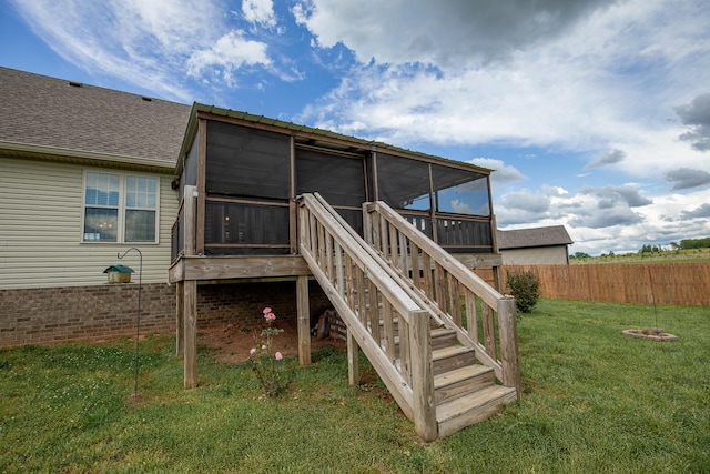 138 Beaver Creek Dr, Portland, TN 37148 - rear view of house with a sunroom, stairway, and roof with shingles