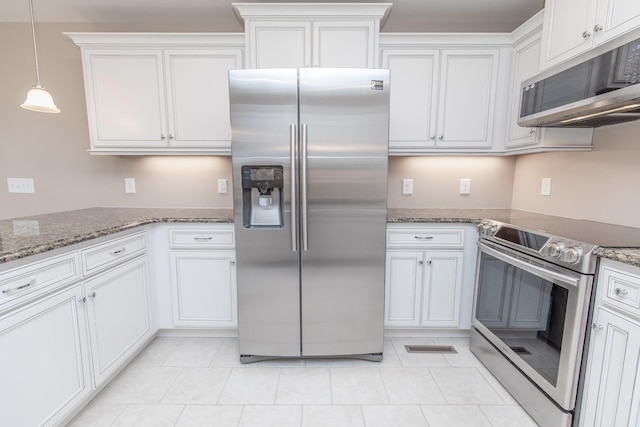 138 Beaver Creek Dr, Portland, TN 37148 - kitchen featuring appliances with stainless steel finishes, white cabinetry, light stone counters, and pendant lighting