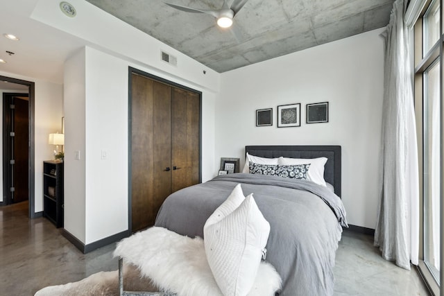 1510 Demonbreun St Unit 711, Nashville, TN 37203 - bedroom featuring concrete flooring, baseboards, a closet, a ceiling fan, and recessed lighting