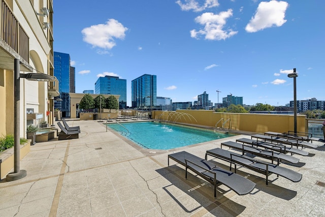 1510 Demonbreun St Unit 711, Nashville, TN 37203 - community pool featuring a city view and a patio area