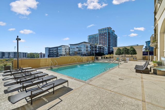1510 Demonbreun St Unit 711, Nashville, TN 37203 - community pool featuring a patio and a city view