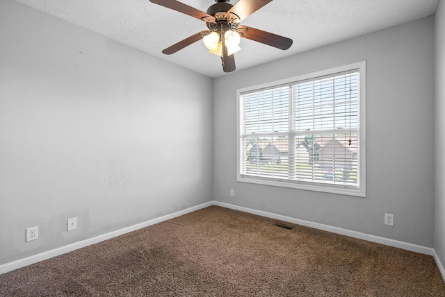1382 Whitt Ln, Clarksville, TN 37042 - carpeted empty room featuring baseboards, a ceiling fan, and a textured ceiling