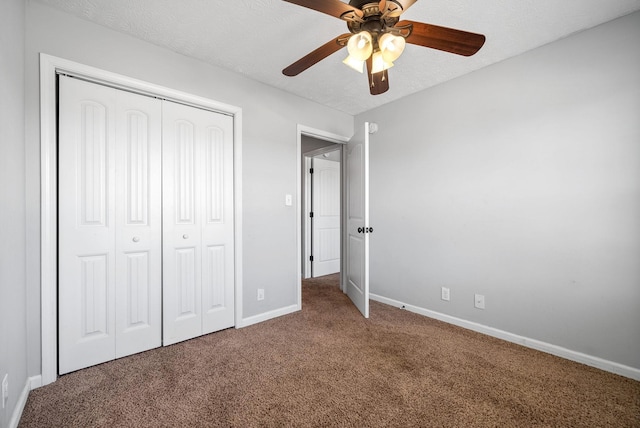 1382 Whitt Ln, Clarksville, TN 37042 - unfurnished bedroom with carpet, a closet, baseboards, and a ceiling fan