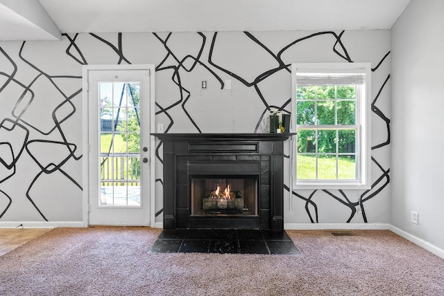 1382 Whitt Ln, Clarksville, TN 37042 - detailed view of carpet floors, a fireplace with flush hearth, and baseboards